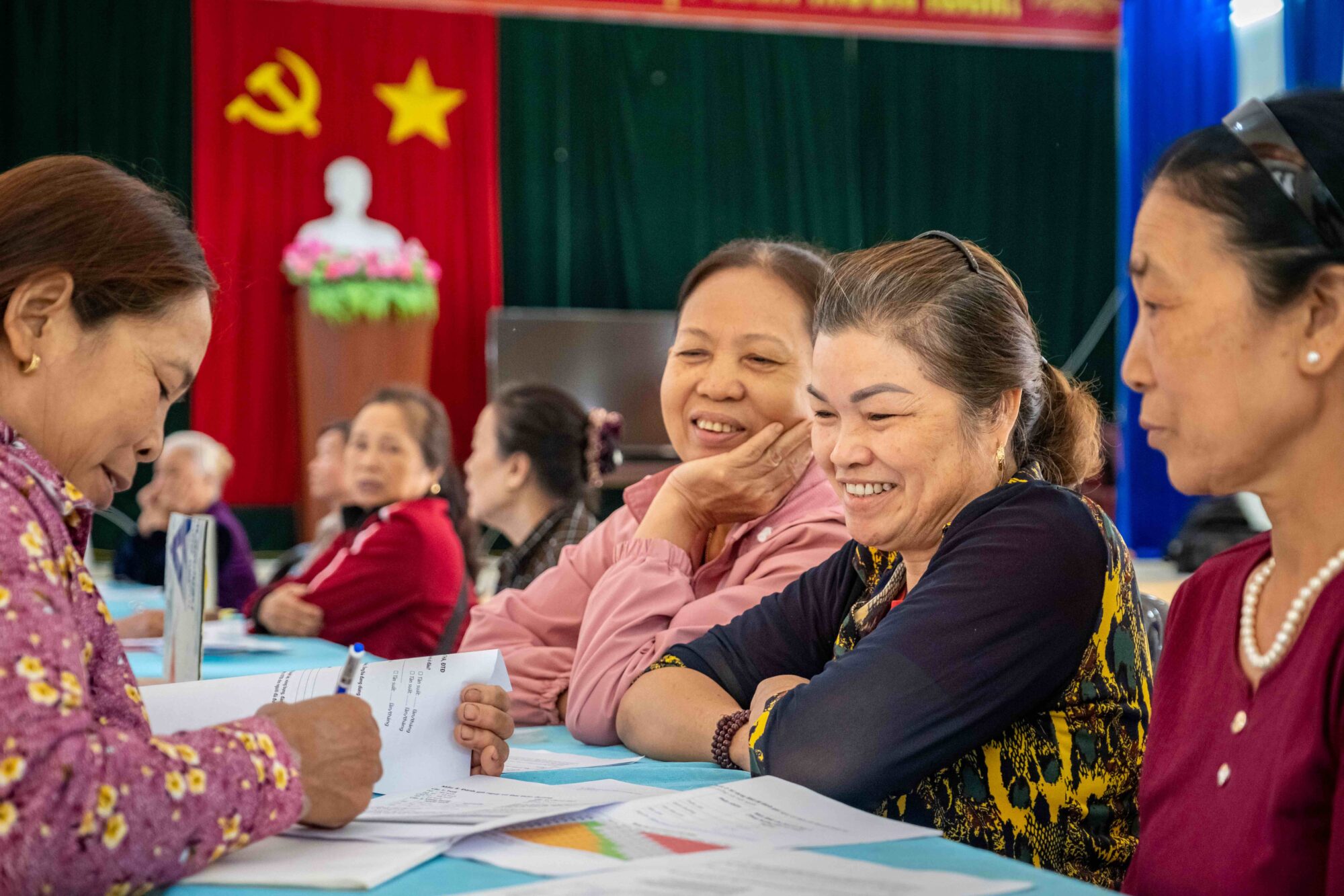 Members of My Loc 1 Intergenerational Self-Help Club take part in the health check activities during a club meeting on March 29, 2023 in My Loc 1 Village, Hai Phong, Vietnam.